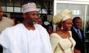 INEC Chairman, Prof. Attahiru Jega (left) and Delta State INEC Resident Electoral Commissioner (REC), Dame Gesila Khan,  during the arrival of the INEC Chairman at the Asaba  Airport on a two-day tour of INEC facilities in Delta  State last Monday.