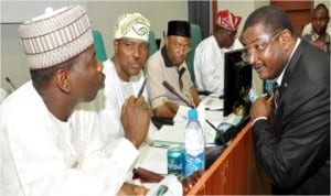 L-R:NNPC Group Managing Director, Mr Andrew Yakubu (right), with members of the House Joint Committee on Petroleum Resources Downstream, Upstream and Justice, investigating the alleged connivance of NNPC with Swiss Oil dealers to rob Nigeria in Abuja, yesterday 