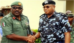 Commander, 2 Brigade, Brig.-Gen. Osasogie Uzamere (left), welcoming the Commissioner of Police, Rivers Command, Mr Tunde Ogunsakin, during his courtesy visit to the Brigade at Bori Camp in Port Harcourt, last Friday