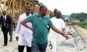 Rivers State Governor, Rt. Hon. Chibuike Amaechi (centre), member representing Opobo/Andoni Federal Constituency, House of Representatives, Hon. Dakuku Peterside (left) and Commissioner for Works, Victor Giadom during the governor’s inspection of the Ogoni/Opobo/Andoni Unity Road, yesterday.