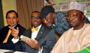 L-R:  Director-General, International Crops Research Institute for the  Semi-Arid Tropics (icrisat), Mr William Dar, Minister of Agriculture, Dr Akinwumi Adesina,  geneticist and plant breeder, Prof. Candidus Echekwu and representative of the Senate President, Sen. Joshua Lidani,at  the launch of groundnut value chain in Abuja , recently. Photo: NAN