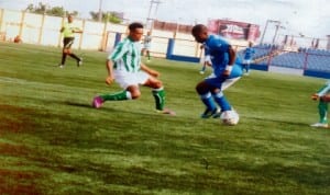 Dolphins player trying to block a Sharks striker during a league match in Port Harcourt, recently.
