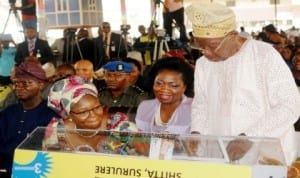 L-R: Governor Babatunde Fashola of Lagos State; his wife, Mrs Abimbola; member, House of Representatives, Mrs Abike Dabiri-Erewa and former Lagos State Governor, Alhaji Lateef Jakande, at the 1st Draw of Lagos Home Ownership Mortgage Scheme In Lagos recently. Photo: NAN