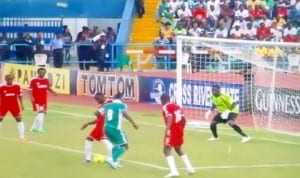 Super Eagles player trying to outsmart an opponent during a friendly match in Nigeria, recently