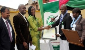L-R: Factory Manager, Intercolor Paint Industries, Enugu, Mr Kaartmik Kejaan, National Sales Manager, Mr Ike Ezeh, Managing Director, Mrs Juliet Okeke, representative of Director General, Standards Organisation of Nigeria (SON), Mr Terna Kudzah and SON official, Mrs Maryrose Ugwueche, at the presentation of SON's Nancap Award to inter color in Enugu recently.
