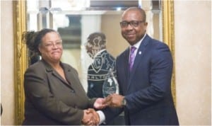 Executive Director, Rivers State Sustainable Development Agency (RSSDA), Mr Noble Pepple (right) receiving the African Government Agency of the Year 2013 award from an official of the African Leadership Magazine,  in Washington DC, United States, recently.