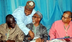 Commissioner for Environment, Katsina State, Mr Jamilu Danmusa (2nd left) in a handshake with representative of Food and Agriculture Organisation, Mr Rabe Mani (2nd right), at the opening of 2014 seasonal rainfall prediction follow-up workshop in Abuja last Thursday. With them are Consultant and Team Leader, Extension, Federal Ministry of Agriculture and Rural Development,  Prof. Tunji Arokoyo (left) and President, Global Climate Technology, Dr Shrikant Jagtap. Photo: NAN