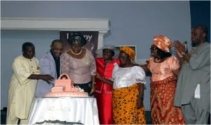 R-L. Rivers State Governor, Rt. Hon. Chibuike Rotimi Amaechi watch with other family members, while Pastor George Izunwa and his wife cut the cake to mark the 40th birthday of Mrs Emmanuela Izunwa at Gateway International Church in Port Harcourt, yesterday.