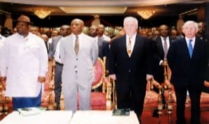  Rivers State Governor, Rt Hon Chibuike Rotimi Amaechi (2nd left) obeying National Anthem. With him are  former Prime Minister of Ireland,  His Excellency John Bruton (2nd right), former British Foreign Secretary, His Excellency Jack Straw (right) and  Deputy Governor of Rivers State, Engr. Tele Ikuru (left) during an  International Conference on Democracy and Good Governance, organised by Rivers State government at Banquet Hall,  Government House, Port Harcourt. Photo:  Egberi A. Sampson