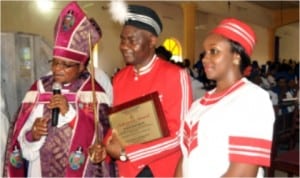 Senator Magnus Abe (middle), his wife, Bariyaah (right) and Bishop Solomon Gberegbara shortly after the recognition of Sen Abe with the award of Nehemiah of the Anglican Diocese of Ogoni in Bori