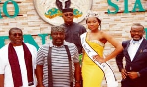 Governor Rochas Okorocha of Imo State (2nd-left); Deputy Governor, Prince Ezemadumere (left), Miss Black Africa UK, Miss Sonia Ike (2nd-right) and Commissioner for Information and Strategy, Dr Toedore Ekechi, during the visit of the beauty queen to the Government House in Owerri recently. Photo: NAN