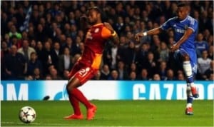 Samuel Eto’o (right) scoring Chelsea’s first goal last night against Galasataray in the second leg of UEFA Champions League