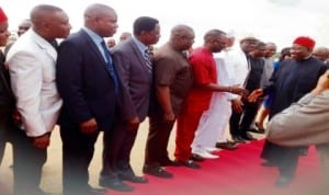 President Goodluck Jonathan in a hand shake with  some Delta State Commissioners  on his arrival at the Asaba International Airport enroute Anambra  State for the ground  breaking for the second Niger Bridge in Onitsha,  recently.