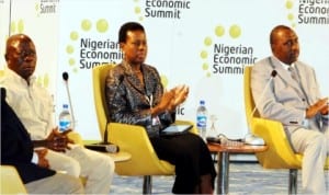 L-R: Gov. Adams Oshiomhole; Vice-Chairman, Nigerian Economic Summit Group (nesg), Mrs Sola David-Borha, and Supervisory Minister of National Planning, Amb. Bashir Yuguda, at the close of the 20th Nigerian Economic Summit in Abuja, yesterday.