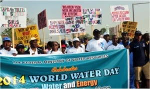 Permanent Secretary, Ministry of Water Resources, Alhaji Baba Farouk (5th left), with other stakeholders , on a walk to commemorate the World Water Day in Abuja,yesterday
