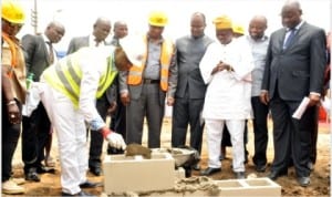 Rivers State Governor, Chibuike Amaechi laying the foundation stone of the Nigeria Union of Journalists Secretariat Complex in Port Harcourt, last Wednesday. He is flanked by Commissioner of Information & Communications, Mrs. Ibim Semenitari (left), NUJ National President, Mohammed Garba (5th right), RATTAWU National President, Dr. Yemisi Bamgbose (3rd right), Mr. Victor Agusiobo of Nigeria Guide of Editors (4th right), Chairman, Rivers Assembly Committee on Information, Onari Rrown (2nd right) and Chairman, NUJ, Rivers State Council, Mr. Opaka Dokubo, during the ground breaking ceremony in Port Harcourt.