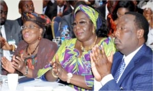 L-R: Supervising Minister of Economy, Dr Ngozi Okonjo-Iweala, Minister of Lands, Housing and Urban Development, Mrs Akon Eyakenyi and Deputy Governor of Kogi State, Chief Yemi Awoniyi, at the Stakeholders' Implementation Summit On Enabling Broader Access to Housing Finance For all Nigerians in Abuja, last Monday.