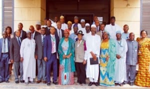   Minister of Environment, Mrs Lawrencia Labaran-Mallam (middle), with the Management Staff of the Ministry during her assumption of duty in Abuja, recently. 