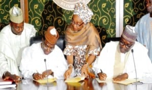 L-R: Governor Isa Yuguda of Bauchi State (2nd-left) and Minister of Health, Prof. Onyebuchi Chukwu (right), signing an MoU for National Vesicovaginal Fistula (VVF) Centre in Bauchi, last Monday. Photo: NAN.
