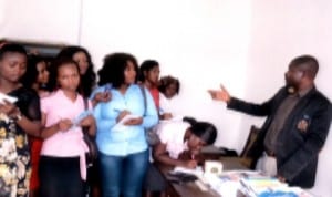 Dr Alpheaus Paul-Worika (right), Acting Group News Editor, explaining a point to students of the University of Port Harcourt, during their visit  to the Rivers State Newspaper Corporation last week. Photo: Ibioye Diama