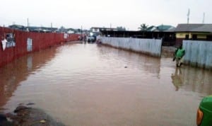 Community High School and Z.I. Primary School II in Akure, Ogun State, cut off  by flood due to early morning rain last Monday. 