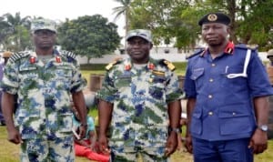 L-R:  Executive Officer, Nns Pathfinder, Capt. Sam  Bura,  Commander,  Commodore Godwin Ochai and  Deputy Commandant and Head of Operations, Nigeria Security and Civil Defence Corps (Nscdc),  Rivers State, Mr Olowoyotan Bamidele,  during  hand over of seven suspects and 250 drums  of illegally refined  diesel to Nscdc  in Port Harcourt, recently.