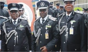 L-R: Commissioner of Police, Mr Okeke Godfrey; Commandant, Police Staff College Jos, Mr Bala Hassan and Coordinator of Courses, Police Staff College  Jos, Mr Jibrin Yakubu, during the graduation of the Police Advanced Detective  Course 60/2014 in Jos, yesterday 