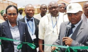 L-R: Principal Manager, Training, Nigerian Ports Authority (NPA)  Patricia Aboh, Vice-President, Membership Development, Enugu Chamber of Commerce, Industry, Mines and Agriculture, Mr Emeka Nwakpa, Vice-President, Trade Fair, Mr Jasper Nduagwuike and representative of NPA Managing Director, Mr Lawrence Oladele, inaugurating NPA atand at the 25th Enugu International Trade Fair, recently.