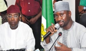 Director-General, National Emergency Management Agency (NEMA), Alhaji  Muhammad Sidi (right), briefing newsmen on the update on Nyanya bomb explosion in  Abuja, last Monday. With him is Secretary-General, Nigerian Red Cross  Society, Mr Bello Diram.