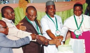 L-R: Representative of the Institute of Management Technology, Enugu, Prof. Joseph Ngwu, Anglican Bishop of Nsukka Diocese, Rt. Rev. Aphonsus Agbo, Deputy Vice Chancellor, Academics, Prof. Polycarp Chigbo, Chairman, Peace Mass Transit Limited, Mr Sam Onyishi and Catholic Bishop of Nsukka, Rt. Rev. Godfrey Onah, cutting the 25th Anniversary Cake at the Samuel Maduka Onyishi African Entrepreneuship Foundation Scholarship in Enugu last Tuesday. Photo: NAN