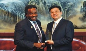 PHCCIMA President, Engr Emeka Unachukwu (left),  presenting a membership plaque to the Consular General, Liu Khan