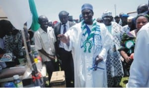 Governor Mukhtar Yero of Kaduna State (middle),  inspecting startr packs  distributed to trained beneficiaries of SURE-P Programme in Kaduna last Wednesday.