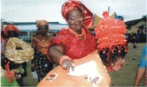 Rivers State Commissioner for Information and Communications, Mrs Ibim Semenitari appreciating the dance steps of Mrs Dorathy I Toby who performed the traditional Egerebite/Bibite womanhood ceremony at Toby Polo in Opobo Kingdom, yesterday