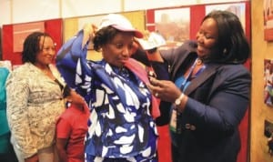 Wife of Rivers State Governor, Dame Judith Amaechi (middle), State Commissioner for Information and Communications, Mrs Ibim Semenitari (right) and Patience Ozokwo, during the opening ceremony of the Port Harcourt World Book Capital in Port Harcourt, yesterday.