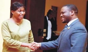 Head of the United Nations Operation in Cote d’ Ivoire (UNOCI), Ms Aichatou Mindaoudou (left), in a hand shake with President, Cote d’ Ivoire’s National Assembly,  Mr Guillaume Soro  in Abidjan last Wednesday. 