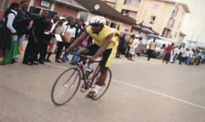 A cyclist taking the lead during a national event in  Port Harcourt, Rivers State, recently.