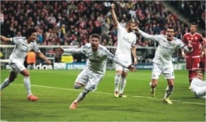 Sergio Ramos (2nd left) celebrating his brace against Bayern Munich last night in Germany