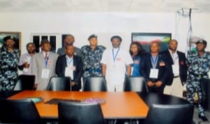 Rivers State Commissioner of Police, Tunde Ogunsakin (middle), with his deputy, CP Alkali Shaba (right) and Assistant  CP, Administration, G.F Esele (left) in a group photograph with Etche Brothers Assembly, during their courtesy visit to the Commisisoner of Police in Port Harcourt, recently.            Photo: Egberi A. Sampson