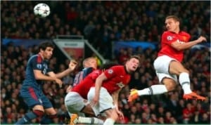 Man United’s Nemanja Vidic (right) nodding his side ahead against Bayern Munich at Old Trafford in the UEFA Champions League quarter final, last night