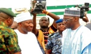 President Goodlock Jonathan (left), being received by Governor Abdulfath Ahmed of Kwara  State at the Airport in Ilorin, recently. Photo: NAN