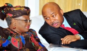 Coordinating Minister of Economy and Minister of Finance, Dr Ngozi Okonjo-Iweala (left), with president, Global Distance Learning Institute, Abuja, Prof. Manny Aniebonam, during the inauguration of the institute in Abuja, recently.