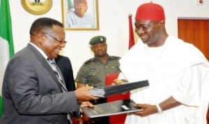 Executive Secretary, African Capacity Building  Foundation (acbf), Prof. Emmanuel Nnadozie (left), exchanging documents with Deputy Senate President, Sen. Ike Ekweremadu, after signing projects grants agreement between National Institute for Legislative Studies (nils) and acbf in Abuja, recently. Photo: NAN