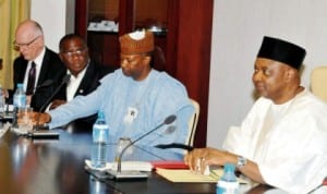 L-R: Managing Director, Transmission Company of Nigeria (TCN), Mr Mack Kast; TCN Deputy Chairman, Mr Sola Akinfemiwa; Chairman, Mr Ibrahim Waziri and Vice-President Namadi Sambo, at a  meeting in Abuja recently. Photo: NAN