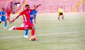 Sharks players in control of the ball during Glo league match in Port Harcourt, Rivers State, recently