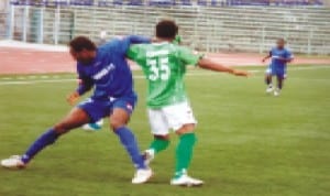 Sharks FC player trying to beat an opponent during a Premier League game in Port Harcourt, Rivers State recently