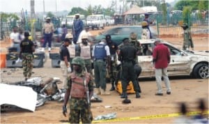 Security personnel  at the scene of Nyanya explosion in Abuja, last Friday