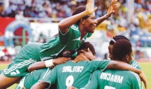 Super Falcons celebrating a victory during a world cup competition recently