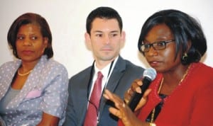 L-R: World Bank Country Director, Marie Francoise Marie-Nelly; World Bank Economist, Matthew Morton, and Special Adviser to the Minister of  Finance, Dr Chika Akporji, at the presentation of gender at work in Abuja last Tuesday. Photo: NAN