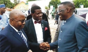 L-R: Kwara State Commissioner for Justice, Mr Kamaldeen Ajibade, Chairman, Kwara State branch of Nigeria Bar Association (NBA), Mr Mobolaji Ojibara welcoming Governor Abdulfatah Ahmed of Kwara State to the 2014 Biennial Law Week in Ilorin, recently.