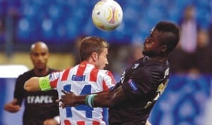 John Ogu (right) in club action. he has found playing time hard to come by at Academica.